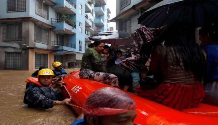 Nepal flooding and landslides: Death toll reaches 65