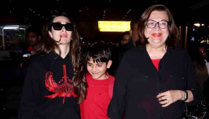 Karisma Kapoor flies back from London with children, twins with mother Babita in black — Pics inside
