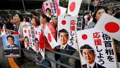 Shinzo Abe secures majority in Japan election