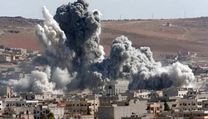 At least 32 killed in air strikes in rebel-held city in Syria, say rescuers
