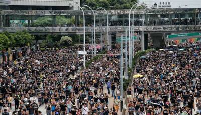 Protesters mass in Hong Kong amid fears of growing cycle of violence