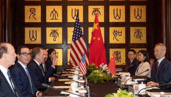 Top US, Chinese officials meet in bid to end year-long trade war amid Trump's tough talks