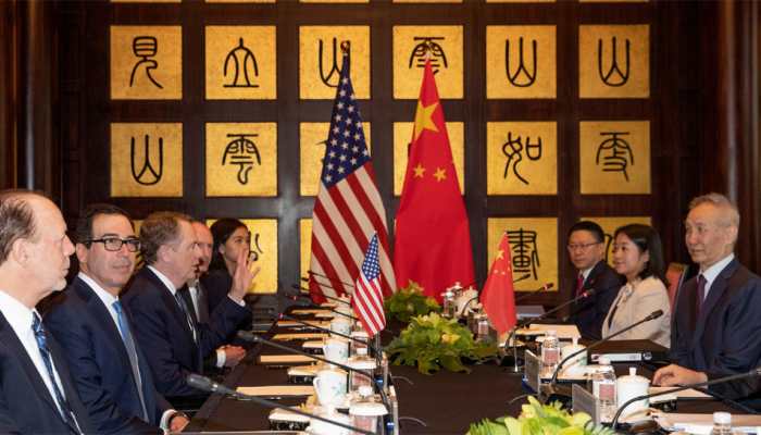 Top US, Chinese officials meet in bid to end year-long trade war amid Trump's tough talks