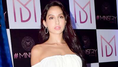 Nora Fatehi flaunts her perfect figure in a white off-shoulder top—Pics