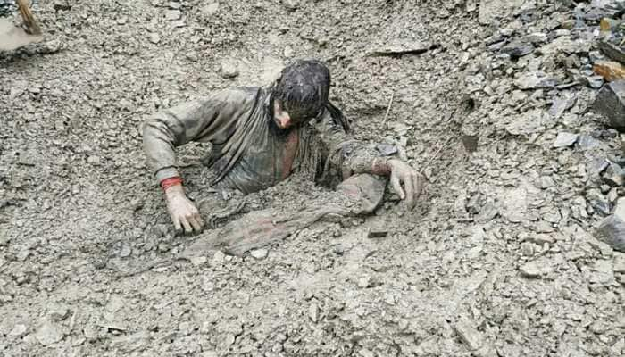 Man trapped overnight in landslide rescued by CRPF, Army personnel in J&amp;K