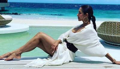 Malaika Arora oozes oomph as a beach babe on Travel+Leisure magazine cover—See photos