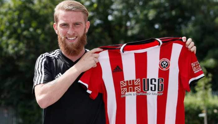 Sheffield United sign Oli McBurnie from Swansea City in a club-record deal