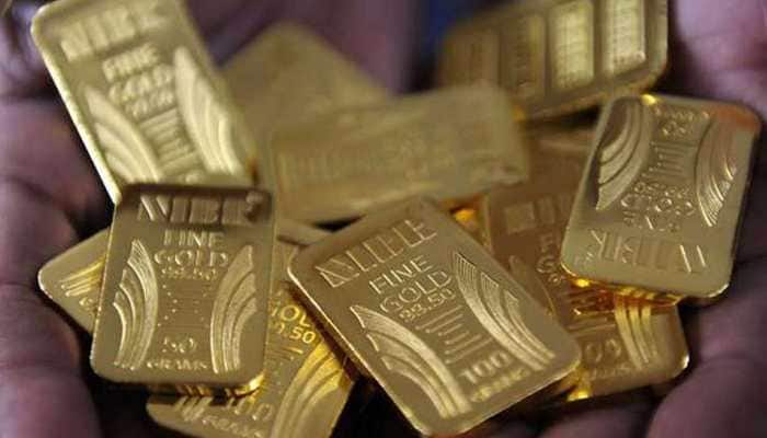 Gold touches record high of Rs 36,327 after Trump&#039;s tariff threat sparks rally