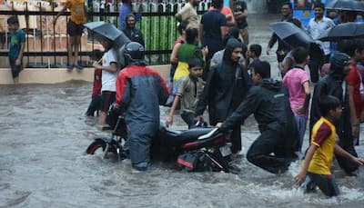 After red alert over Mumbai rains, Maharashtra CM Devendra Fadnavis says 'government working with BMC'