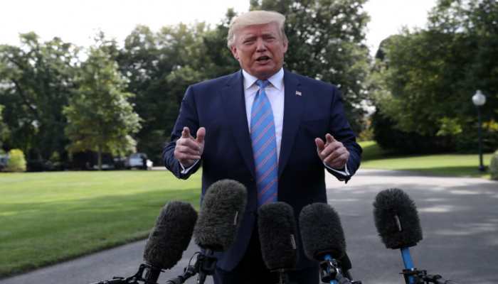 After mass killings, Donald Trump condemns white supremacy