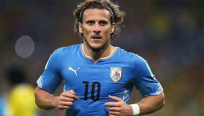Uruguay striker Diego Forlan announces retirement from professional football