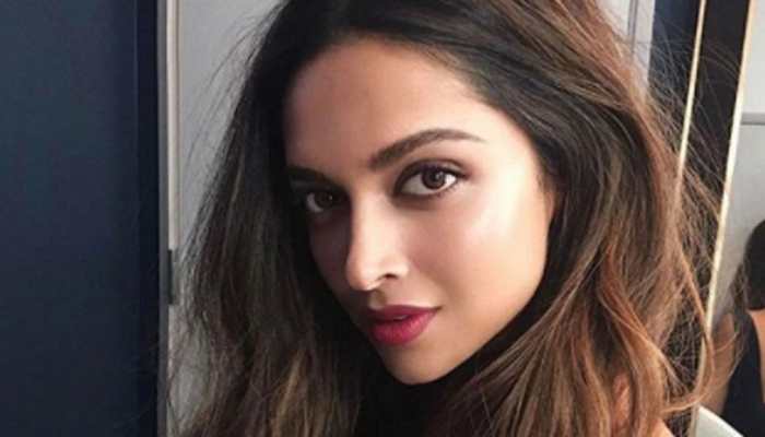 Deepika Padukone obliges young male fan with a photo-op Deepika Padukone obliges young male fan with a photo-op