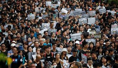 Thousands of teachers join anti-government protests in Hong Kong