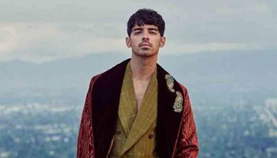 Joe Jonas rings in 30th birthday with Bond theme party