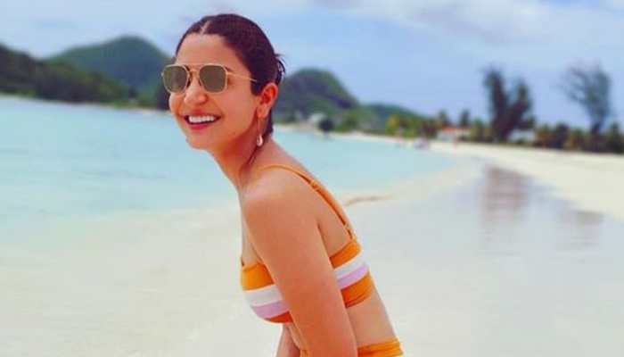 Anushka Sharma&#039;s latest pic in bikini sets internet on fire, hubby Virat Kohli has the best reaction