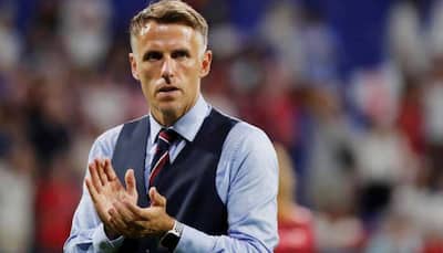Players should boycott social media to combat racist abuse, says Phil Neville