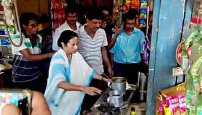 Bengal CM Mamata Banerjee brews tea at local stall during village visit
