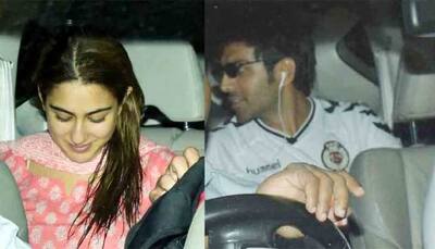 Sara Ali Khan blushes in pink as she receives Kartik Aaryan at airport — See pics