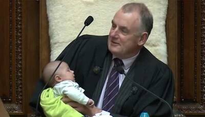 New Zealand speaker feeds baby with bottle in parliament, shares pics on Twitter