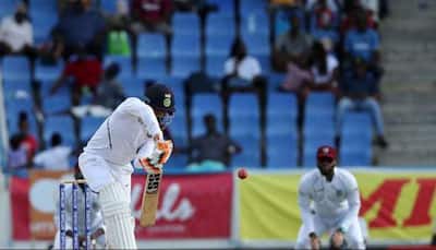 Rain helps West Indies restrict India to 203 for six on opening day