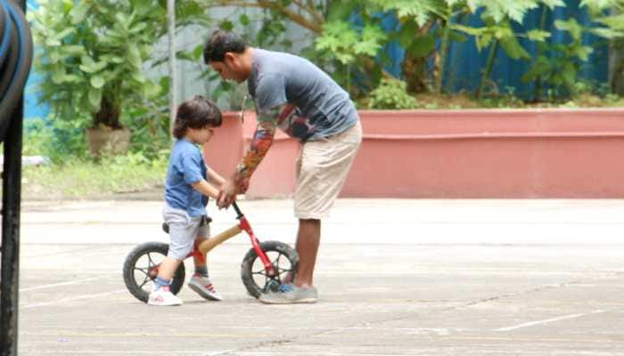 Taimur Ali Khan learns how to ride a bicycle and these pics are beyond cute!