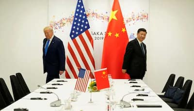 Trade war gets murkier as Donald Trump orders US firms to exit China after tariff hike