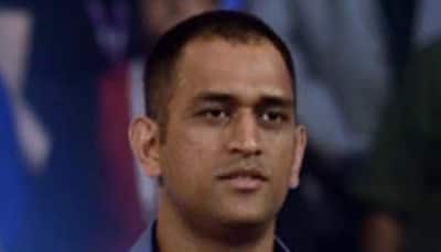MS Dhoni spotted in brand new look at Jaipur airport--Watch