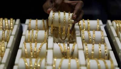 Gold passes $1,550 for first time in over six years on trade jitters