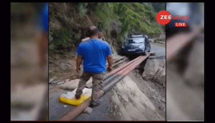 Video shows car crossing washed out road on iron pipes in Himachal Pradesh's Chamba