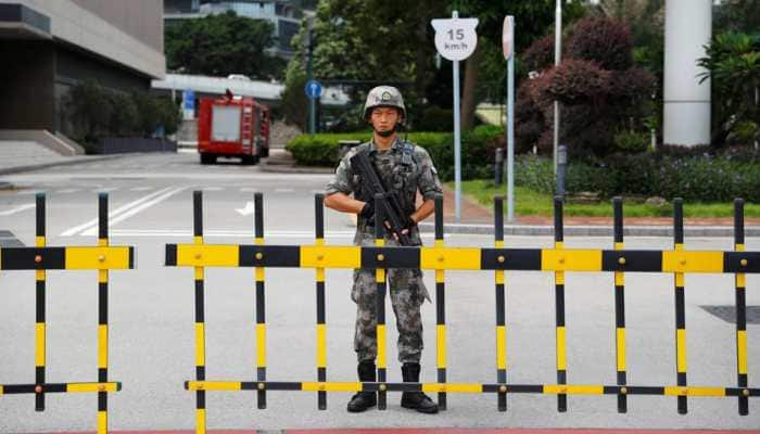 Chinese soldiers in Hong Kong won&#039;t &#039;sit on hands&#039; if situation worsens: China Daily