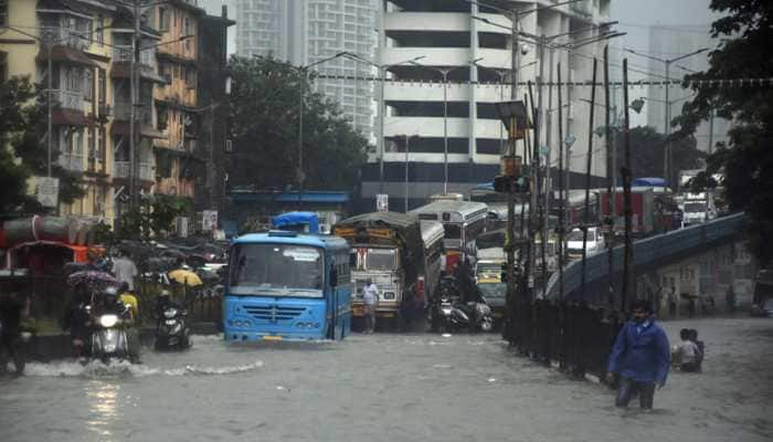 Road, rail, air traffic hit as rains pound Mumbai; heavy showers predicted on Thursday