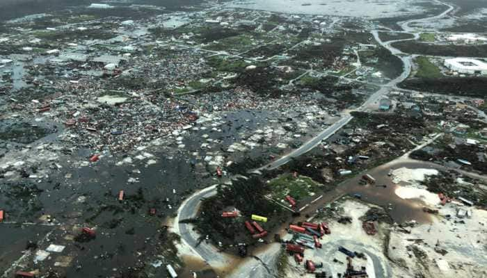 Bahamas staggers from Dorian&#039;&#039;s devastation, US coast fears storm surge