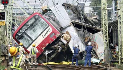 Truck and train collide in Japan, killing one, injuring at least 34