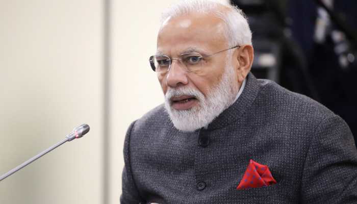 PM Narendra Modi refuses sofa, opts for chair at photo session: Watch