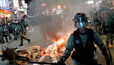 Hong Kong protesters plan to block one of world’s busiest airports after night of violence