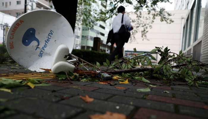 Woman killed as typhoon Faxai lashes Tokyo area, cutting power and transport