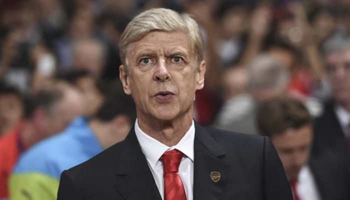 Arsene Wenger says Manchester United not mature enough for title tilt