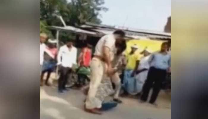2 police officers suspended for thrashing man over alleged traffic violation