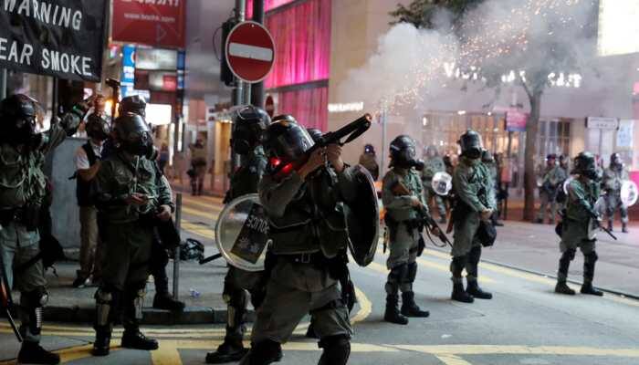 Hong Kong reopens after violent weekend of clashes and protests