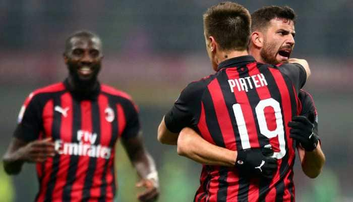 Serie A: Krzysztof Piatek&#039;s penalty gives AC Milan 1-0 win over 10-man Verona