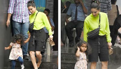 Sunny Leone pulls off a stunning neon outfit on her day out with kids - Photos