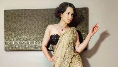 Kangana Ranaut oozes oomph in a shimmering gold saree—Photos