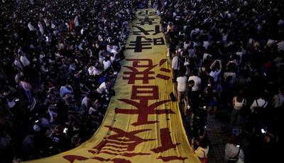 Hong Kong police fire tear gas, water cannon to halt protest as China National Day nears