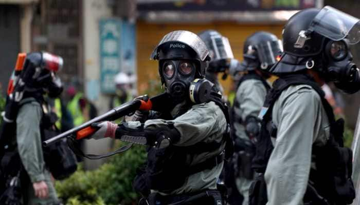 Police shoot teen protester as Hong Kong violence escalates