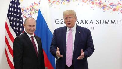 Putin backs Trump in US domestic row, jokes about election meddling