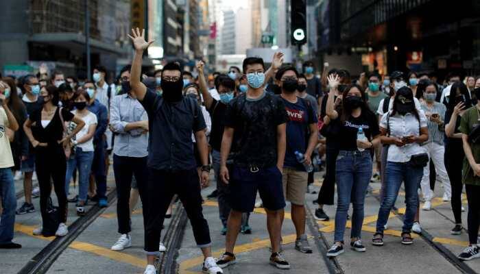 Hundreds return to Hong Kong streets as metro, shops shut after violence