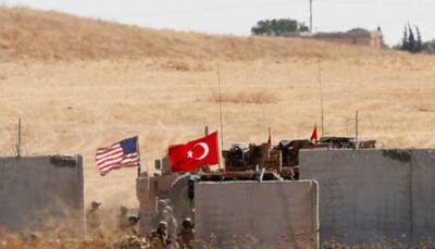Turkey says it's ready for Syria push, Kurds signal Damascus talks