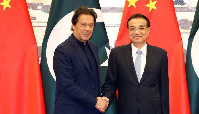 China calls for India-Pakistan talks on Kashmir as Imran Khan meets his Chinese counterpart Li Keqiang