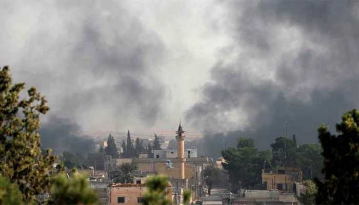 Thousands flee, dozens reported killed as Turkey pushes Syria assault
