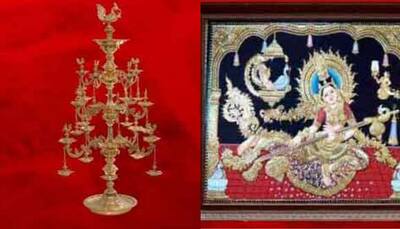 PM Narendra Modi gifts Chinese President Jinping Annam lamp and Thanjavur painting 